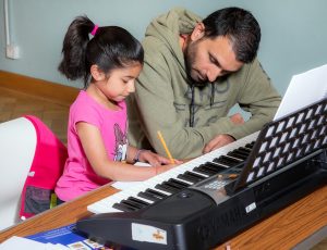 Child and parent in class